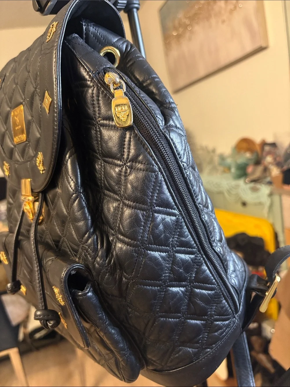 MCM Black Quilted Leather Backpack with Gold Accents